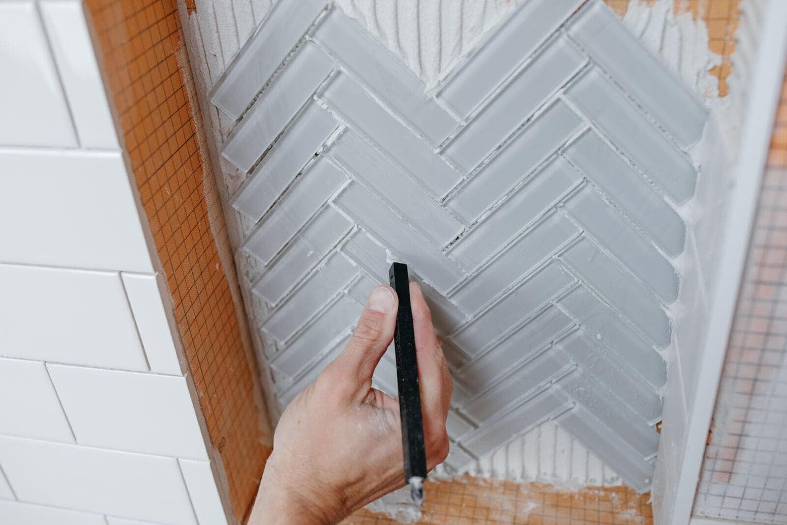 ThinStick used for grout trimming wall tile.